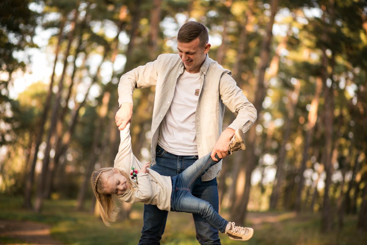 a dad playing with his daughter after receiving an adhd diagnosis